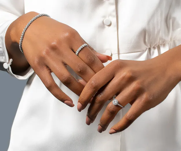 hands displaying jewelry