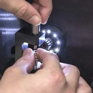 loose moissanite being inscribed