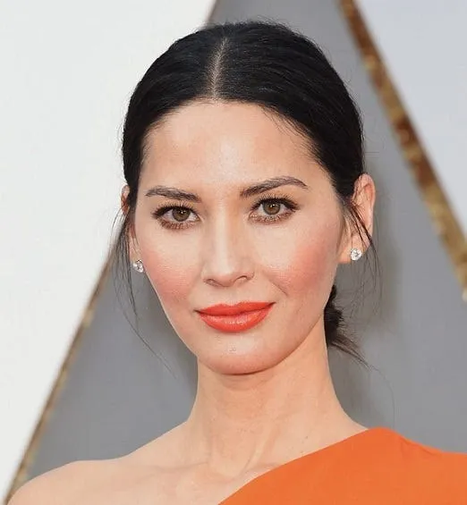 Actress Olivia Munn wearing 4.84 carats of Forevermark stud earrings. Photo via JustJared