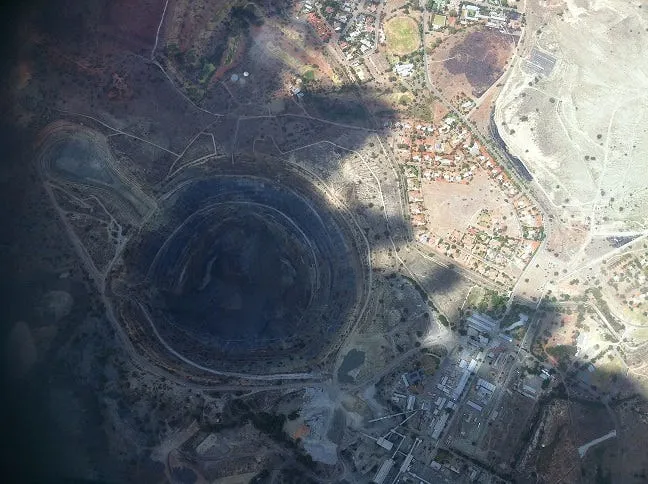 The Kaffiefontein Diamond Mine in South Africa. The mine was closed in 2006, but the enormous hole in the earth remains