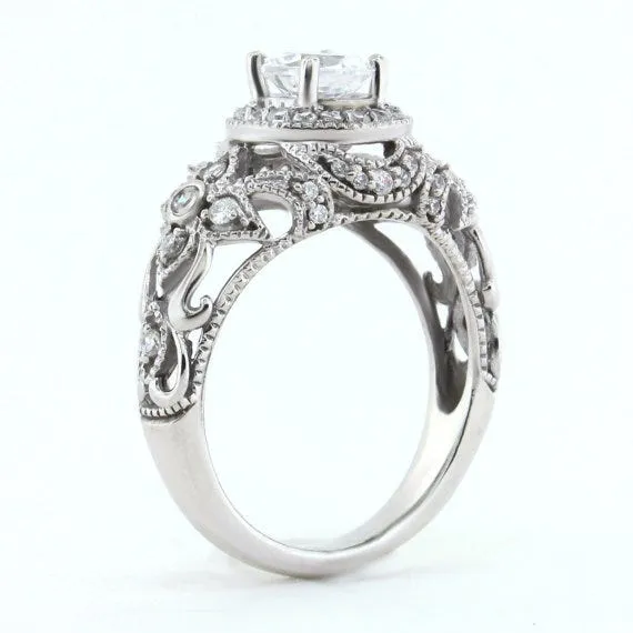 Detailed rings like this one should be cleaned professionally more than once a year. Vintage Inspired Moissanite Engagement Ring, SerenadeDiamonds on Etsy, from $1,440