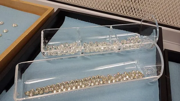Loose moissanite gemstones I saw during the tour – the group on the bottom is awaiting final processing to shine them up!