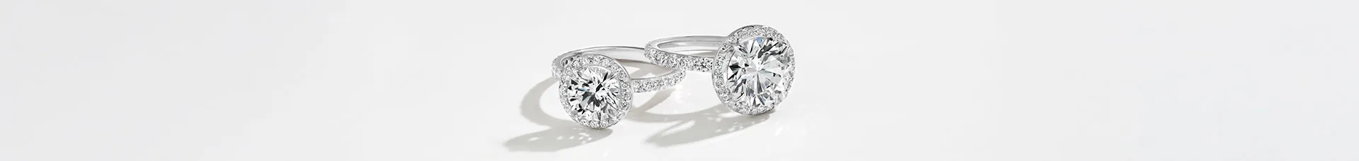 Two white gold gemstone rings