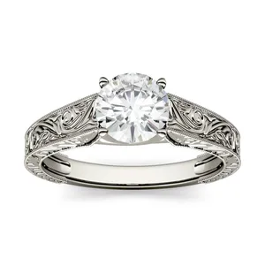 1.00 CTW DEW Round Forever One Moissanite Solitaire with Carved Band Engagement Ring in 14K White Gold image, 