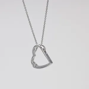 0.13 CTW DEW Moissanite Accented Heart Pendant in Sterling Silver image, 