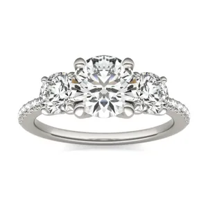 Round Brilliant Trinity Accented Three-Stone Engagement Ring image, 