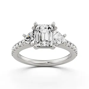 Emerald Three Stone Engagement Ring With Trillion Side Stones image, 