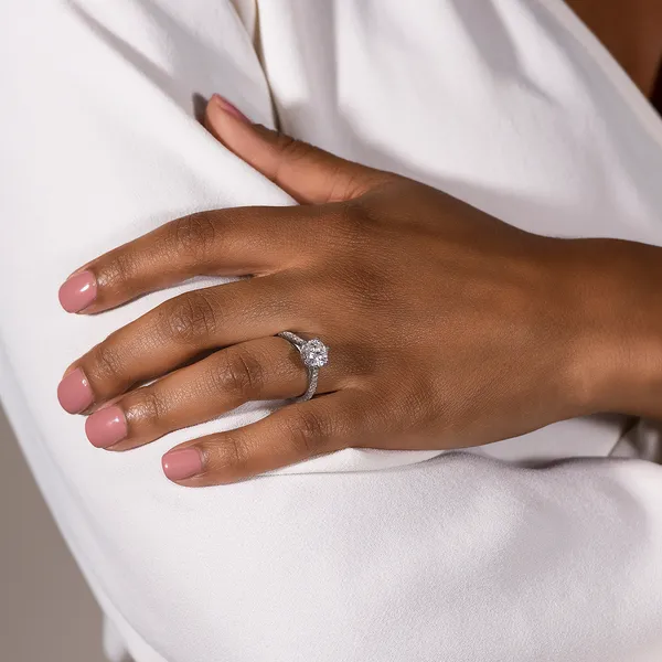 Round Brilliant Accented Six-Prong Trellis Engagement Ring
