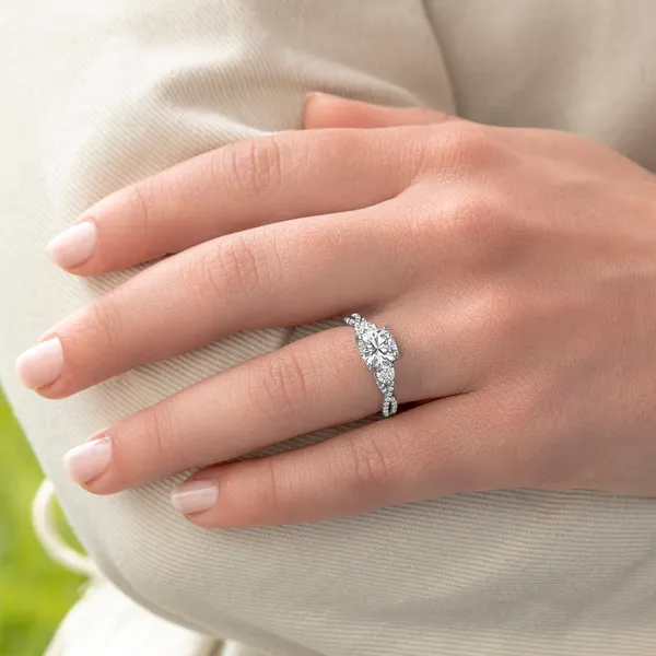 Cushion Twisted Accented Three-Stone Engagement Ring