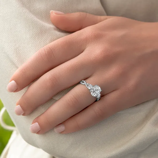 Oval Twisted Accented Three-Stone Engagement Ring