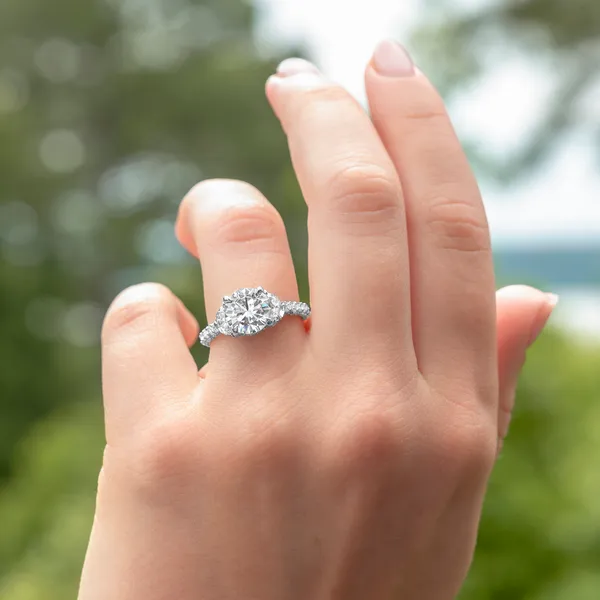Round Brilliant Lumina Three-Stone Engagement Ring