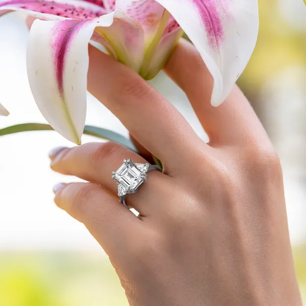 Emerald Claw Prong Trillion Three-Stone Engagement Ring