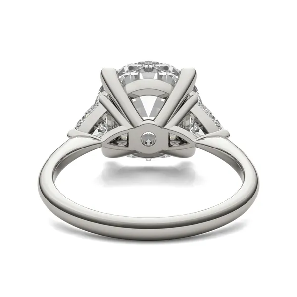 Round Brilliant Claw Prong Trillion Three-Stone Engagement Ring